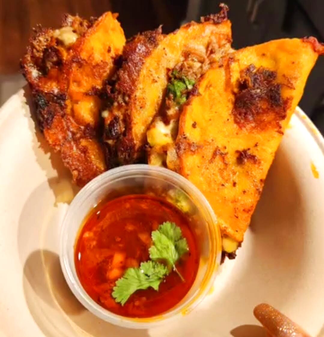 Crispy birria tacos with consommé