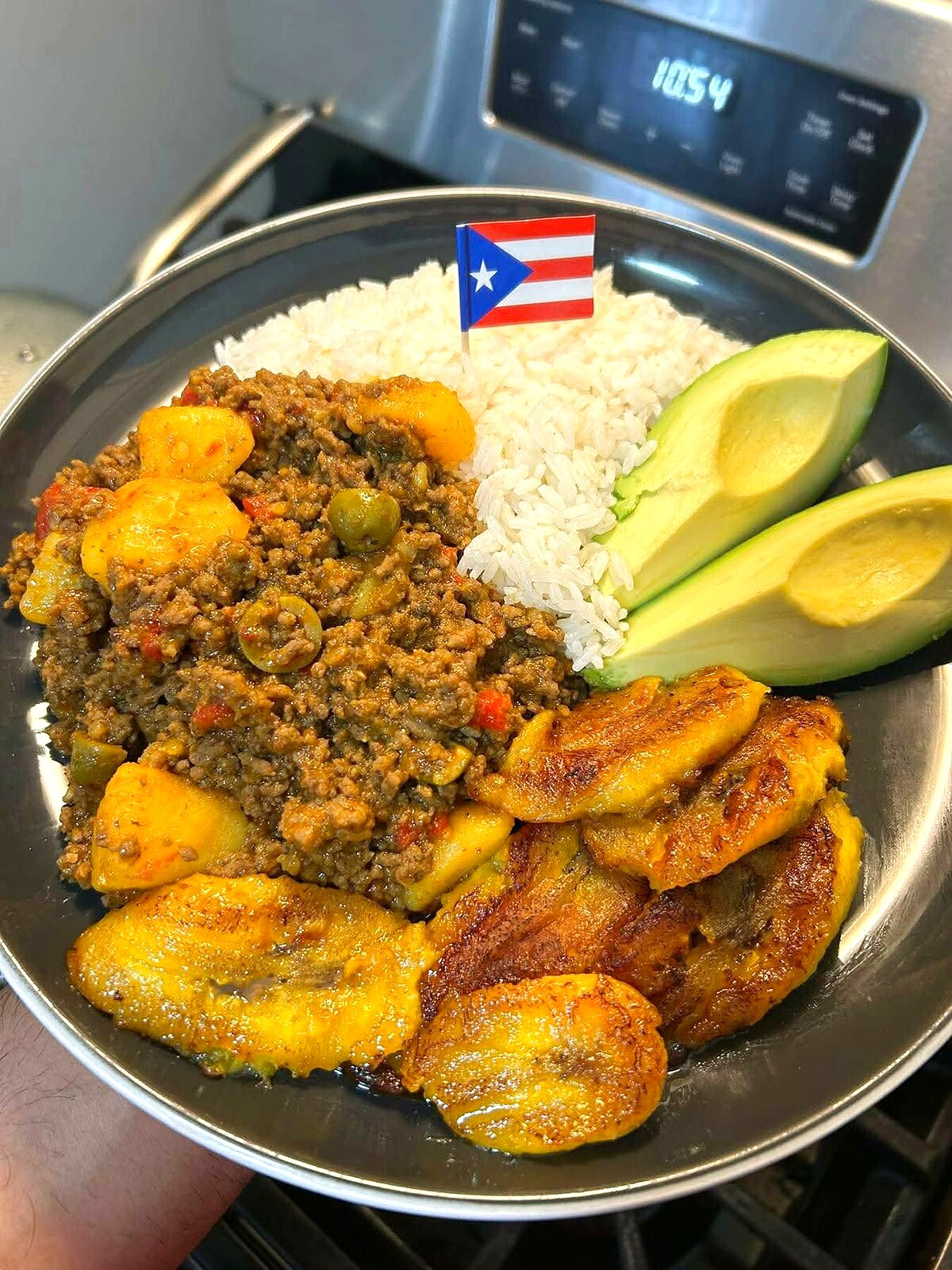 Puerto Rican picadillo with rice, avocado and tostones